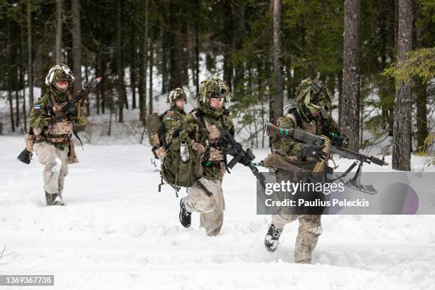 Members of Estonian army during military training together with United Kingdom soldiers at Central Training Area on February 8, 2022 in Lasna,...