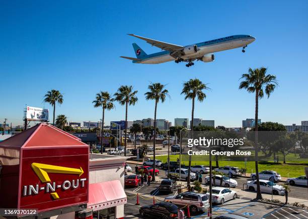 An In-N-Out hamburger restaurant adjacent to a runway at Los Angeles International Airport has become a favorite Instagram spot to photograph jets as...