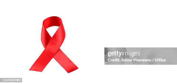 aids awareness red ribbon on white background - hiv test stock pictures, royalty-free photos & images