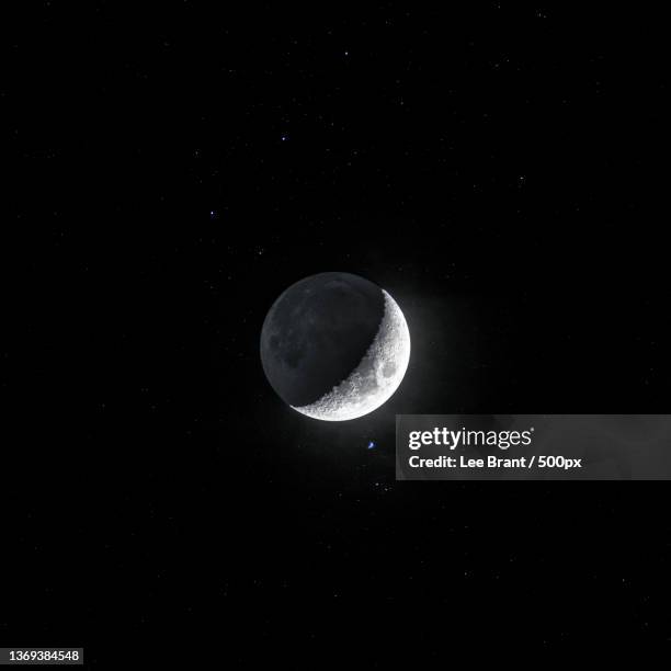 low angle view of moon against sky at night - crescent stock pictures, royalty-free photos & images