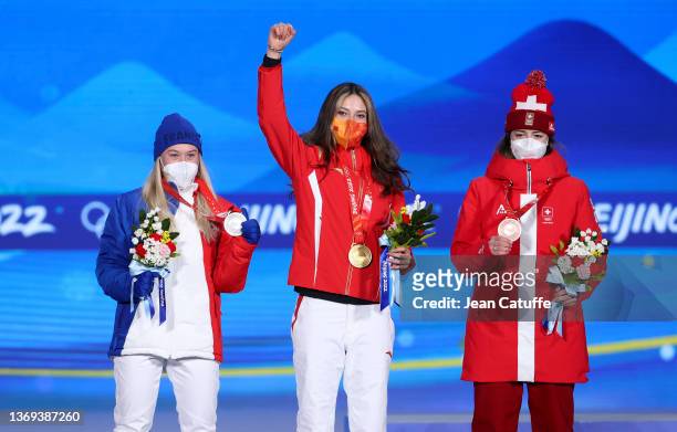 Gold medallist Ailing Eileen Gu of Team China , Silver medallist Tess Ledeux of Team France and Bronze medallist Mathilde Gremaud of Team Switzerland...