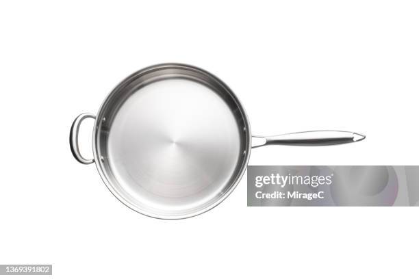 stainless steel cooking pan directly above on white - kochgeschirr stock-fotos und bilder