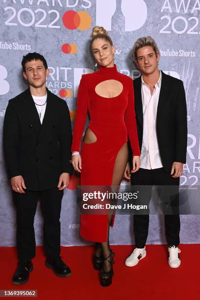 Dan Rothman, Hannah Reid and Dot Major of London Grammar attend The BRIT Awards 2022 at The O2 Arena on February 08, 2022 in London, England.