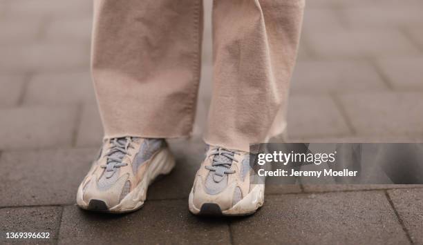 Semra Hunt is seen wearing Zara beige wide denim and Adidas Yeezy beige sneaker on February 07, 2022 in Hamburg, Germany.