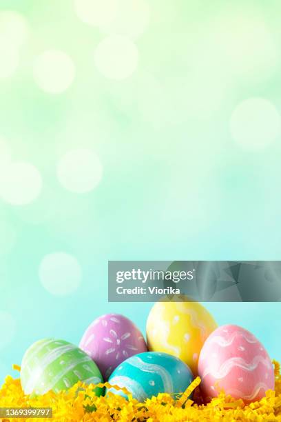 easter eggs with space for copy - easter background stock pictures, royalty-free photos & images