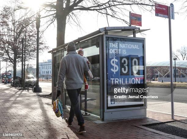Peterson Foundation billboard displaying the national debt is pictured on Pennsylvania Avenue in South East Washington DC on February 08, 2022 in...