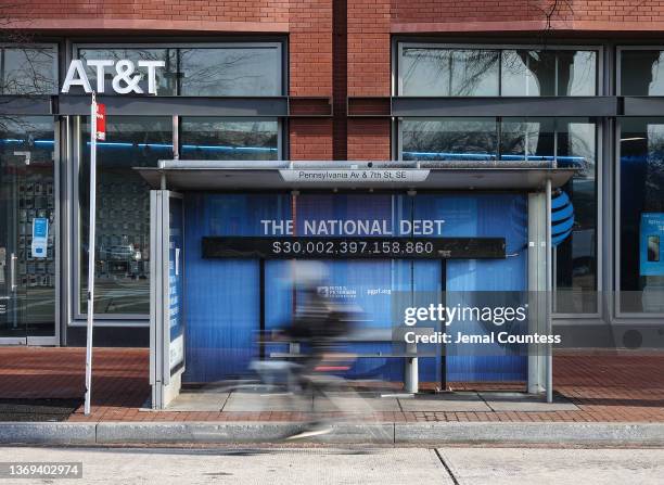 Peterson Foundation billboard displaying the national debt is pictured on Pennsylvania Avenue in South East Washington DC on February 08, 2022 in...