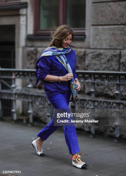 Yasmin von Schlieffen-Nannen is seen wearing Hermes lilac scarf, Joseph lilac sweater, Stouls lilac skinny leather pants and Chanel white ballerina...