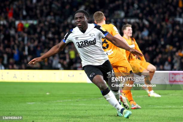 Festy Ebosele of Derby celebrates after scoring their side's third goal during the Sky Bet Championship match between Derby County and Hull City at...