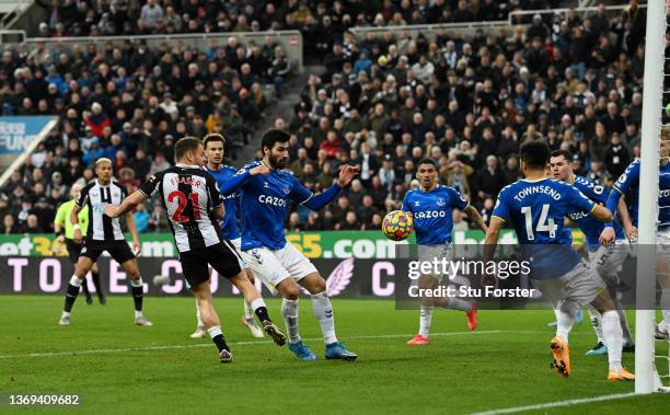 Ryan Fraser of Newcastle United scores their sides second goal during the Premier League match between Newcastle United and Everton at St. James Park...