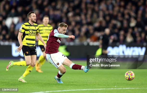 Jarrod Bowen of West Ham United scores their sides first goal during the Premier League match between West Ham United and Watford at London Stadium...