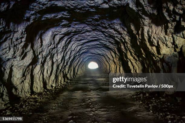 to the light,empty tunnel,erma river gorge,bulgaria - ondergrond stockfoto's en -beelden
