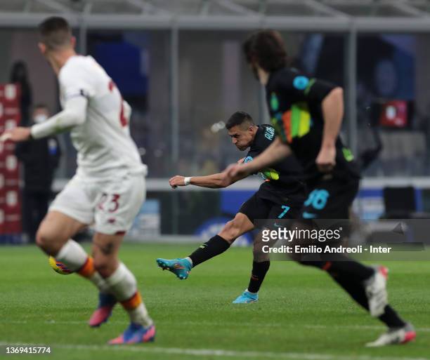 Alexis Sanchez of FC internazionale scores their team's second goal during the Coppa Italia match between FC Internazionale and AS Roma at Stadio...
