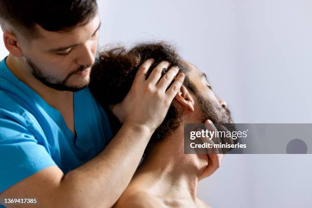 98 Chiropractic Neck Adjustment Stock Photos, High-Res Pictures, and ...