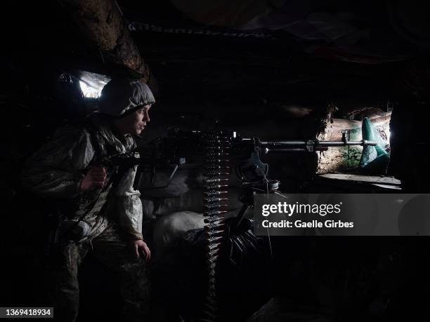 Yaroslav, 21 years-old, soldier in the 25th Airborne Brigade of Ukrainian army, look through the shooting window of the DShK machine gun on February...