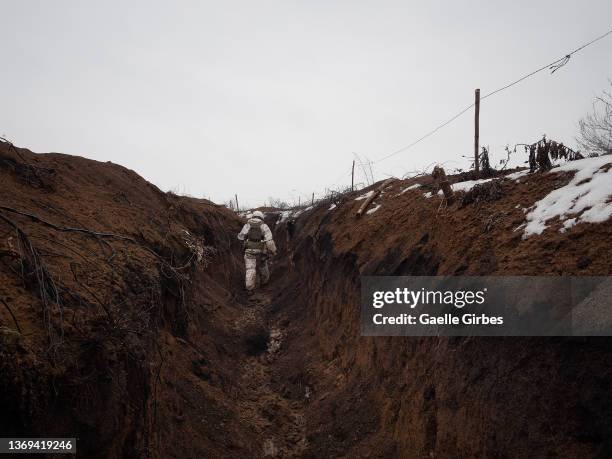 Ukrainian soldier of the 25Th Airborne of the Ukrainian army int the trenches around the city of Avdiyivka on February 8, 2022 in Avdiyivka, Ukraine....