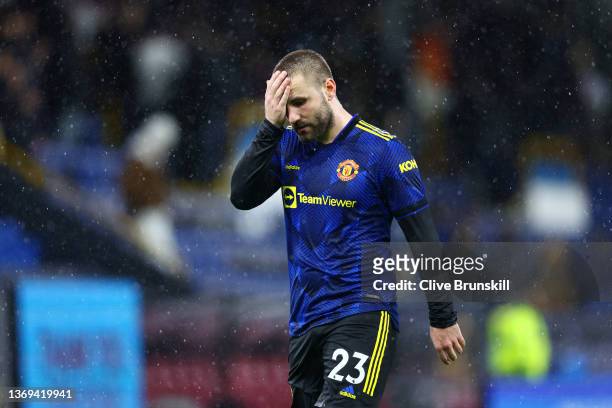 Luke Shaw of Manchester United looks dejected following their draw in the Premier League match between Burnley and Manchester United at Turf Moor on...