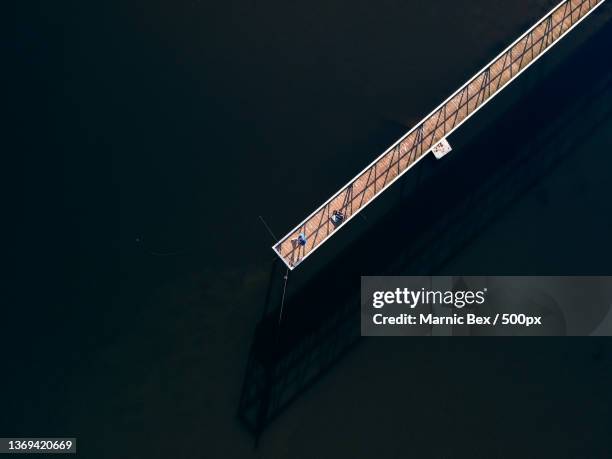 a small fisher on a big lake,belgium - belgium aerial stockfoto's en -beelden