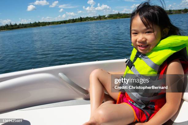 lake vacation fun - life jacket stock pictures, royalty-free photos & images