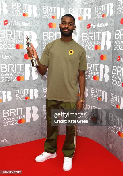Dave poses with his award in the media room during The BRIT Awards 2022 at The O2 Arena on February 08, 2022 in London, England.