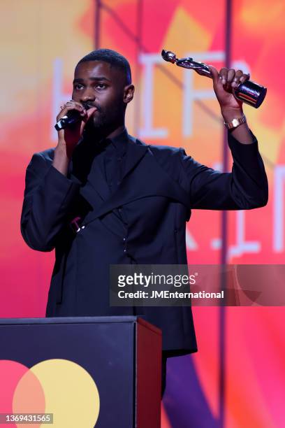 Dave receives the award for Best Hip Hop/Rap/Grime Act during The BRIT Awards 2022 at The O2 Arena on February 08, 2022 in London, England.