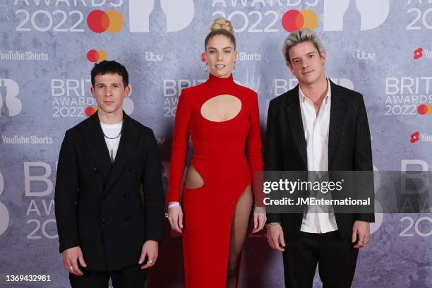 Dan Rothman, Hannah Reid and Dot Major of London Grammar attend The BRIT Awards 2022 at The O2 Arena on February 08, 2022 in London, England.