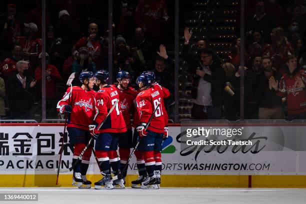 Garnet Hathaway of the Washington Capitals celebrates with teammates after scoring a goal against the Columbus Blue Jackets during the first period...
