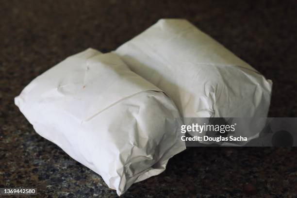 packaged meats from the butcher - butcher paper foto e immagini stock