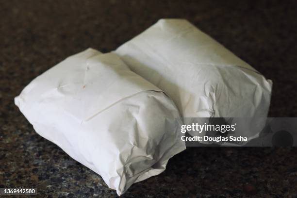 packaged meats from the butcher - butcher paper stock pictures, royalty-free photos & images