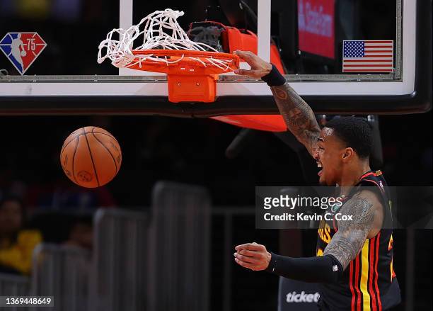 John Collins of the Atlanta Hawks dunks against the Indiana Pacers during the first half at State Farm Arena on February 08, 2022 in Atlanta,...