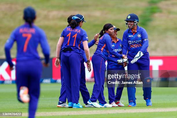 Indian players celebrate a wicket during game one of the T20 International Series between the New Zealand White Ferns and India at John Davies Oval...