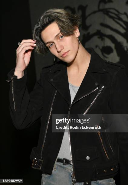Chase "Lil Huddy" Hudson poses for portrait at the AMIRI Autumn-Winter 2022 Runway Show on February 08, 2022 in Los Angeles, California.