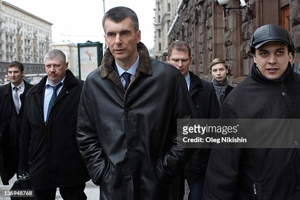 Russian metals tycoon and New Jersey Nets owner, Mikhail Prokhorov, departs after meeting with his supporters at one his campaign offices, on January...