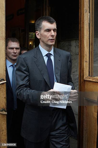 Russian metals tycoon and New Jersey Nets owner, Mikhail Prokhorov, departs after meeting with his supporters at one his campaign offices, on January...