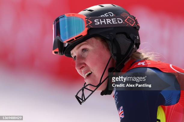 Charlie Guest of Team Great Britain reacts following her run during the Women's Slalom Run 2 on day five of the Beijing 2022 Winter Olympic Games at...