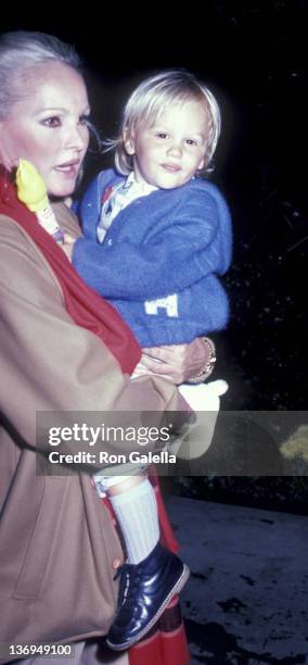Ursula Andress and son Dimitri Hamlin attend Easter Sunday Brunch on April 11, 1982 at the Beverly Hills Hotel in Beverly Hills, California.