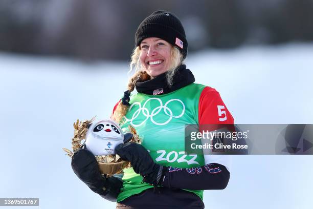 Gold medallist Lindsey Jacobellis of Team United States celebrates during the Women's Snowboard Cross flower ceremony on Day 5 of the Beijing 2022...