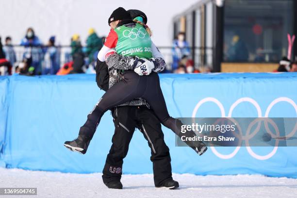 Gold medallist Lindsey Jacobellis of Team United States is embraces after winning the Women's Snowboard Cross Big Final on Day 5 of the Beijing 2022...