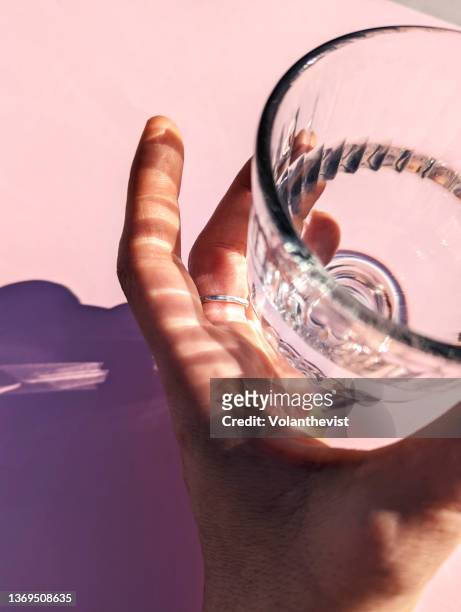 glass with water and hard shadow - glass of water 個照片及圖片檔