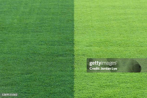 green pitch astro turf background - artificial grass stock pictures, royalty-free photos & images