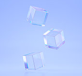 Crystal cubes or blocks with refraction effect of rays in glass. Clear square boxes of acrylic or plexiglass with holographic gradient on blue background, dispersion light, 3d render illustration