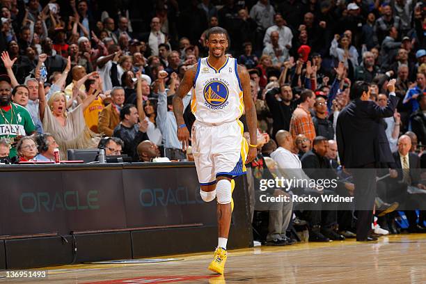 Dorell Wright of the Golden State Warriors celebrates after making a three pointer against the Miami Heat on January 10, 2012 at Oracle Arena in...