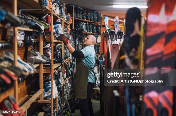 owner of ski retail shop. - sports equipment store stock pictures, royalty-free photos & images