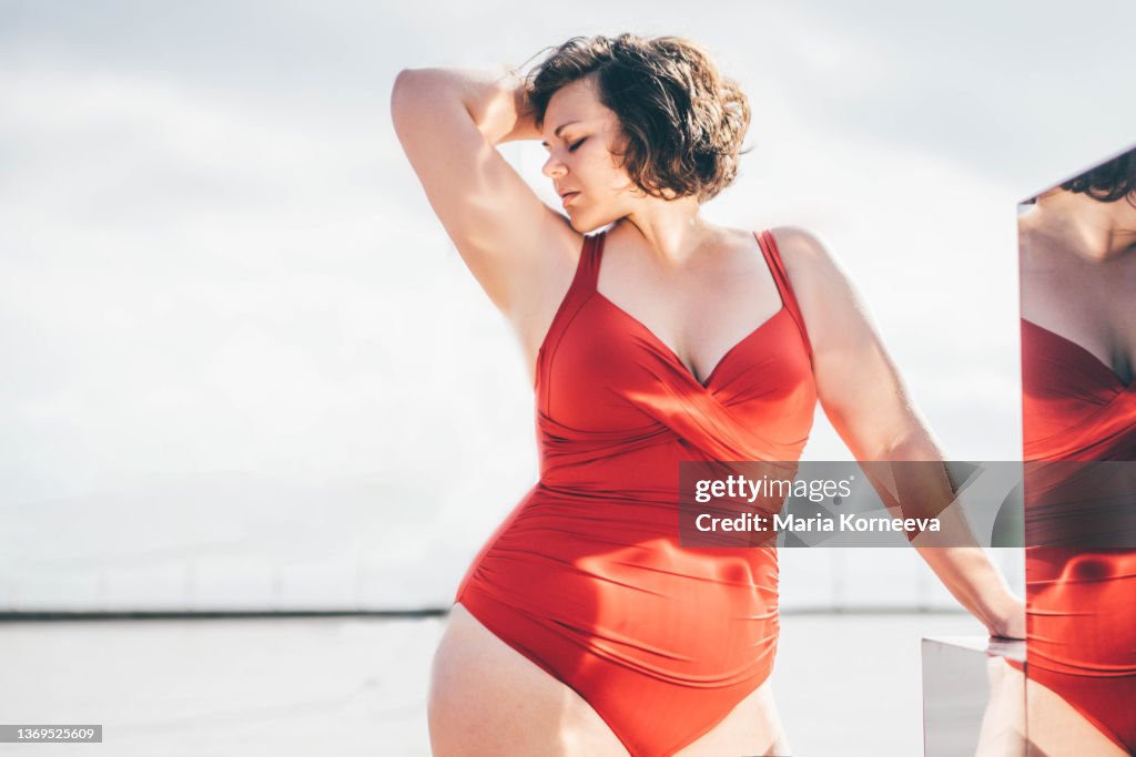 Beautiful curvy woman in swimwear.
