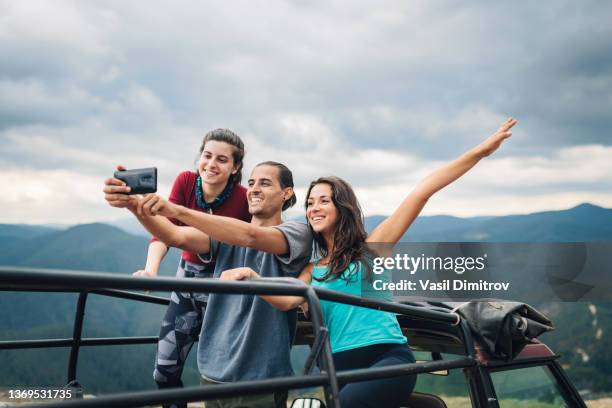 a vacation to remember! - three people selfie stock pictures, royalty-free photos & images