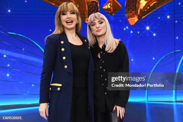 Italian tv host Milly Carlucci and the italian singer Arisa during the photocall of the third edition of the tv broadcast Il Cantante Mascherato at...