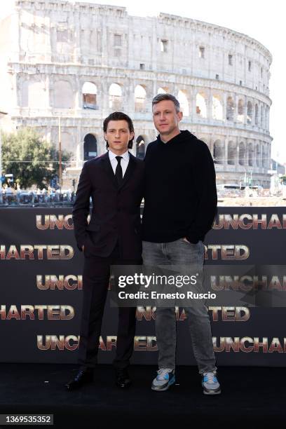 Tom Holland and Ruben Fleischer attend the photocall of the movie "Uncharted" at Palazzo Manfredi on February 09, 2022 in Rome, Italy.