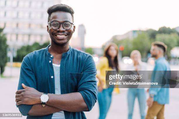 modern young man in the city. - mid twenties fun stock pictures, royalty-free photos & images