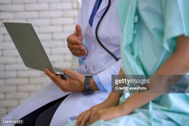 doctor checkup patient at the hospital. - department of health stock pictures, royalty-free photos & images