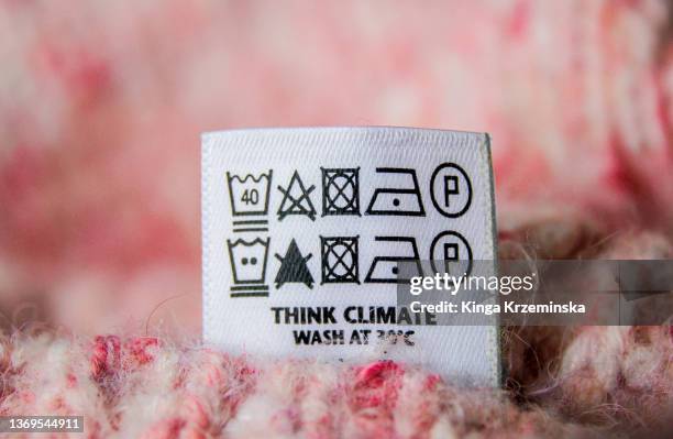 laundry symbols - fashion close up stockfoto's en -beelden